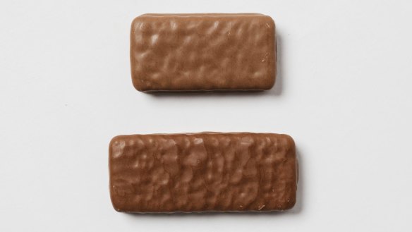 The Tim Tam, top, is smaller than it's British Penguin cousin.