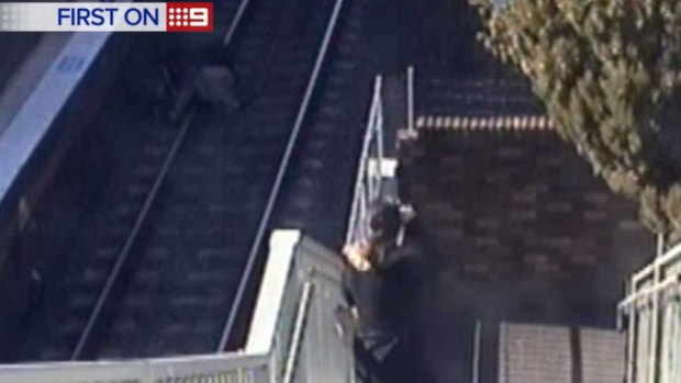 A 62-year-old man went onto the tracks at Wentworthville train station after his granddaughter's pram fell onto the tracks.