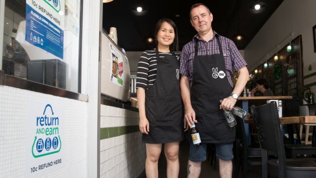 Bee Seesong and Martin McCleave from Two Ones Cafe in Randwick, which will be a local bottle collection point for the new refund scheme in NSW.