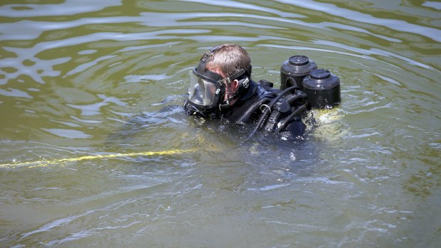 A police diver in the Maribynong River in February.