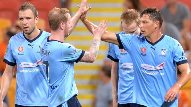 Not enough: Filip Holosko of Sydney FC celebrates with his teammates after scoring.