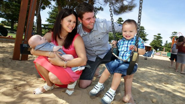 Professional golfer Marc Leishman with wife Audrey and sons Oliver (then three months) and Harvey (then 2) in 2013. 