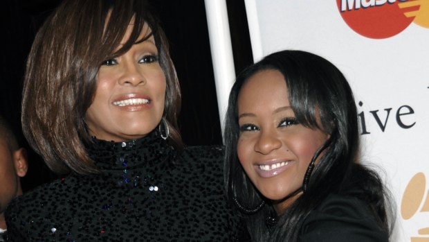 Singer Whitney Houston, left, with her daughter Bobbi Kristina Brown in 2011. 