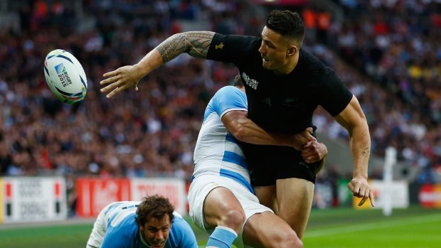Super sub: Sonny Bill Williams gets an offload away during the World Cup win over Argentina.