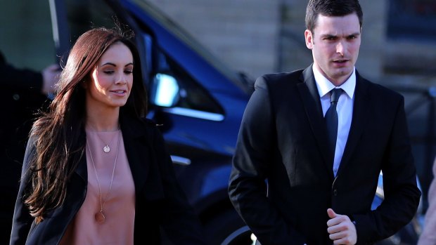 Adam Johnson and girlfriend Stacey Flounders arrive at court in Bradford on Thursday.