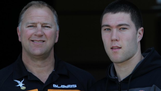 Loyal: Paul Sironen with his son Curtis when they were both in Tigers colours.