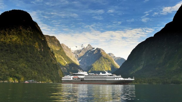 Ponant's L'Austral in dramatic Milford Sound, New Zealand.