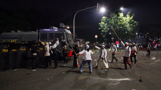 Clashes with police at a rally protesting against Ahok in Jakarta earlier this month.
