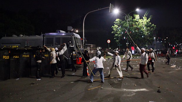 Clashes with police at a rally protesting against Ahok in Jakarta earlier this month.