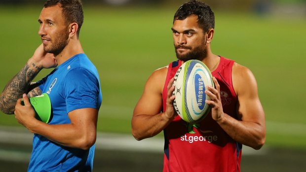Big two: Quade Cooper with new Reds signing Karmichael Hunt at training.