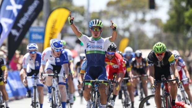 Man of the moment: Caleb Ewan celebrates after winning Friday's stage.