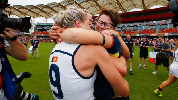 Crows coach Bec Goddard celebrates during the AFL Women's grand final.