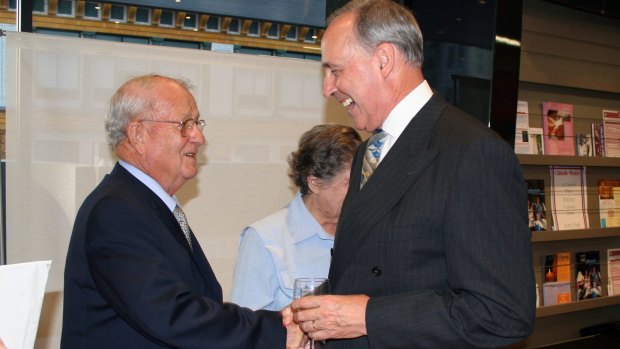 Johno Johnson  receives the Papal Medal from former prime minister Paul Keating. 