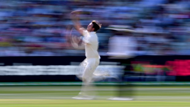 It's all a blur: Mitchell Marsh bowls at the MCG. He was a controversial pick for the Australian team but now has the opportunity to cement his place in the side.