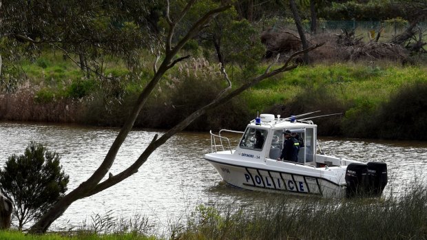 Police search the water near Avondale Heights for missing woman Karen Ristevski.