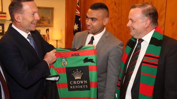 Politics mixing with sport: The then prime minister Tony Abbott was presented with a South Sydney jersey alongside ALP shadow minister and Bunnies tragic Anthony Albanese in 2014.