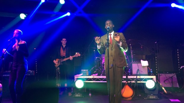 Leon Bridges performing with his band in Melbourne.