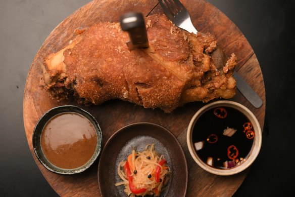 Pata (deep-fried pork knuckle with condiments).