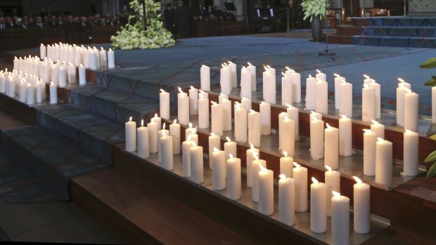Some 150 lit candles commemorating the 150 victims of Germanwings flight 4U 9525 before a church service in Cologne's Cathedral.
