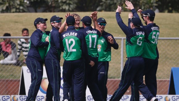 Ireland players celebrate the dismissal of Afghanistan's Najeeb Tarakai during their fifth one-day international cricket match in Greater Noida, India. The rise of Afghanistan and Ireland in the ranks of international cricket gathered pace when they were voted in as full ICC members, meaning they can play test matches against the world's elite countries. 