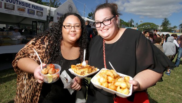 Anne Reed and Kate Steemson get a taste of the Greek food on offer at the 2015 Paniyiri Festival.