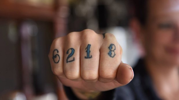 Tattoos ensure the Yarloop postcode will forever remain in the minds of locals and visitors to the devastated town.