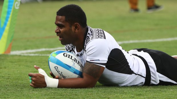 Fijian star: Vatemo Ravouvou scores a try during the Olympic Games.