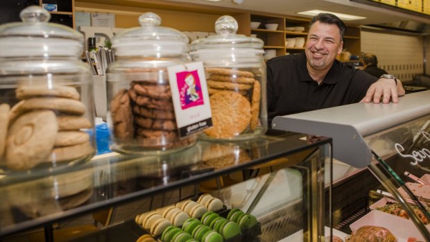 Owner of Lachlan Court Cafe, Spiro Apostolopoulos, behind the counter of his 24th business. 