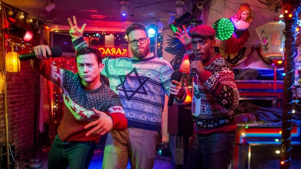 Seth Rogen wears his star of  David Christmas jumper in <i>The Night Before</i>, with left, Joseph Gordon-Levitt  and Anthony Mackie.