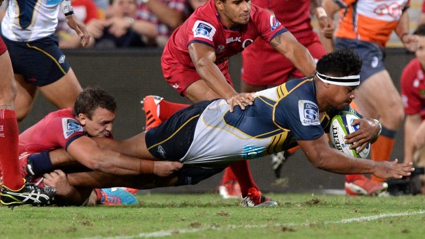 Ita Vaea of the Brumbies scores a try against the Reds.