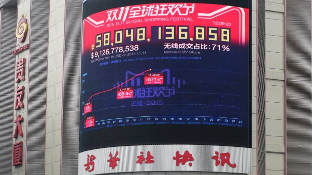 A giant display broadcasts Alibaba's sales in Beijing on Singles Day in 2015.