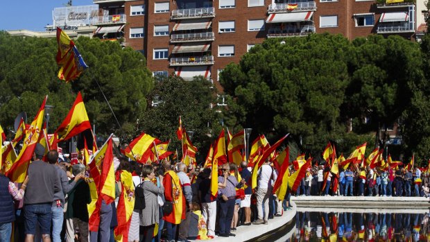 Demonstrators call for unity in Madrid.