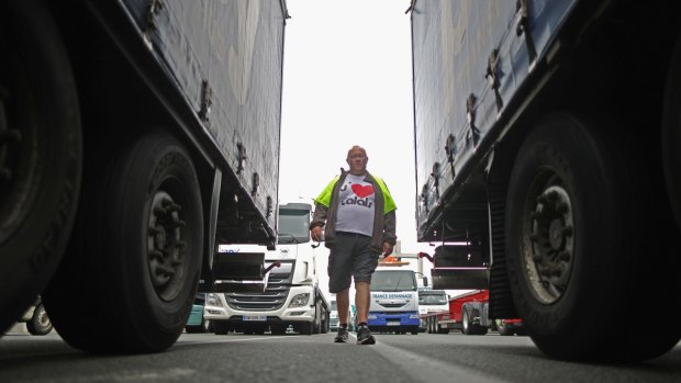 French farmers, truckers and local business owners blockade the main A16 motorway into the Channel Tunnel terminal.
