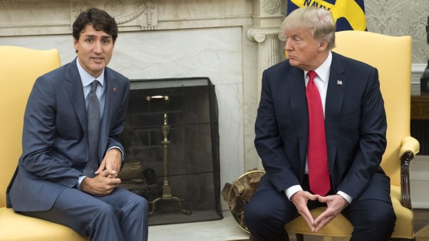 Canadian Prime Minister Justin Trudeau meets US President Donald Trump, who has renewed his threat to walk away from the North American Free Trade Agreement on the eve of fresh negotiations.