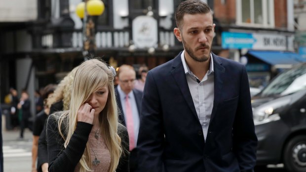 Connie Yates and Chris Gard, parents of critically ill baby Charlie, arrive at the High Court in London.