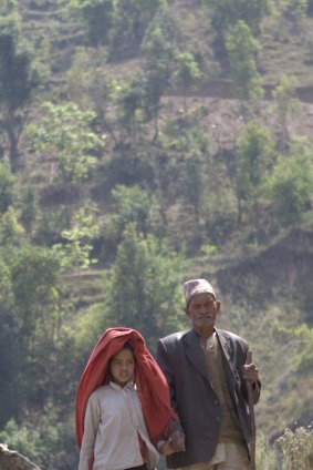 Jokh and his granddaughter Kamala on their way to an eye clinic to get his cataract treated.