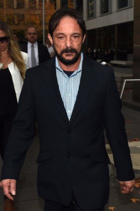 Nicholas George leaves the County Court in Melbourne on Thursday night.