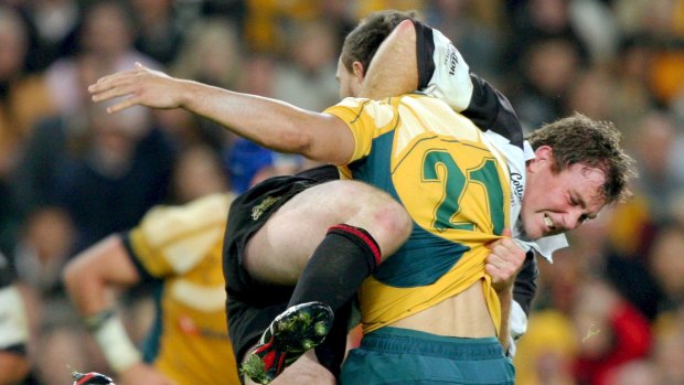 Quade Cooper tangles with the Barbarians with the Wallabies back in 2009.