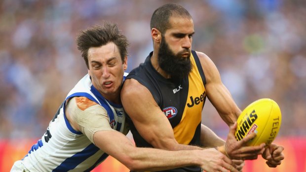 Tiger down: Bachar Houli will miss Saturday night's clash against the Swans.