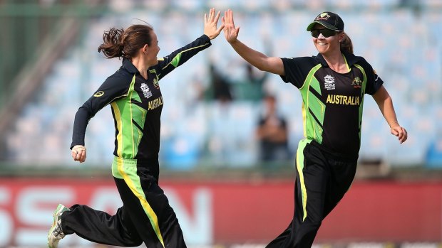 Erin Osborne and Meg Lanning celebrate a wicket at the women's World T20 tournament.