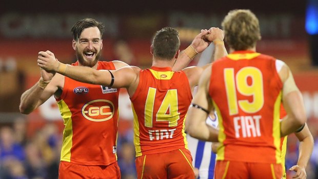 Charlie Dixon (left), soon to be out of contract, is looking at a five-year offer from the Brisbane Lions worth about $3 million.