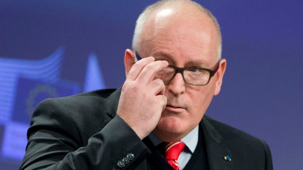 European Commission Vice-President Frans Timmermans at EU headquarters in Brussels on Wednesday. The EU's executive has triggered proceedings against Poland that could lead to sanctions over its decision.