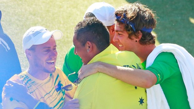 Lleyton Hewitt celebrates with his Davis Cup teammates