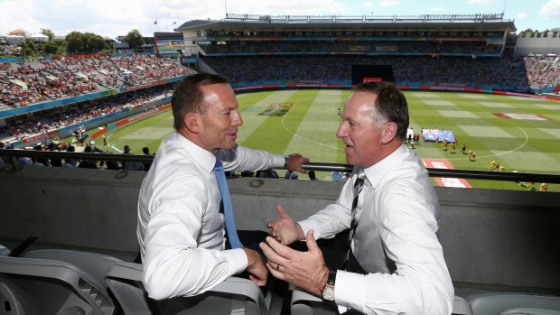 Friendly rivalry: Tony Abbott and John Key at the cricket in Auckland.