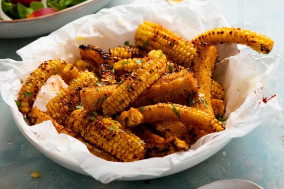 Paprika-dusted corn ribs with garlic butter.