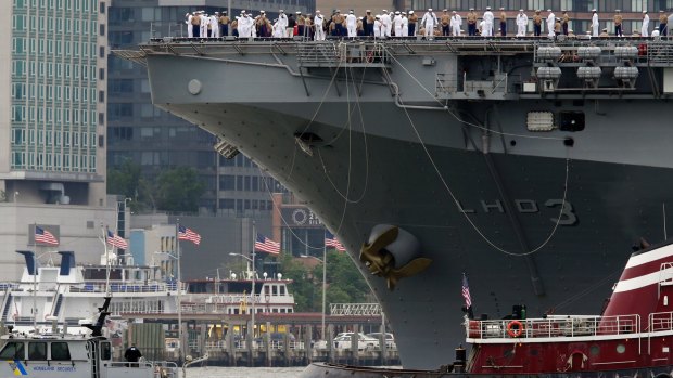 The USS Kearsarge moves up the Hudson River as part of New York's Fleet Week .
