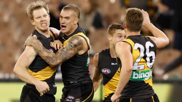 Jack Riewoldt and Dustin Martin celebrate a goal in the clash with Gold Coast in round 12.