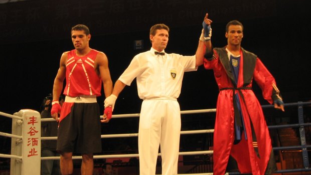 Wayne Rose, boxing referee, in centre.