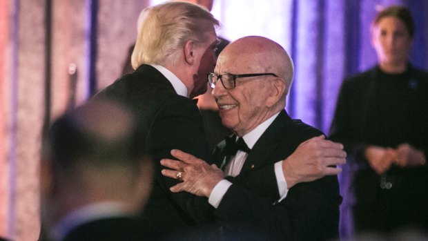 Rupert Murdoch embraces President Trump.