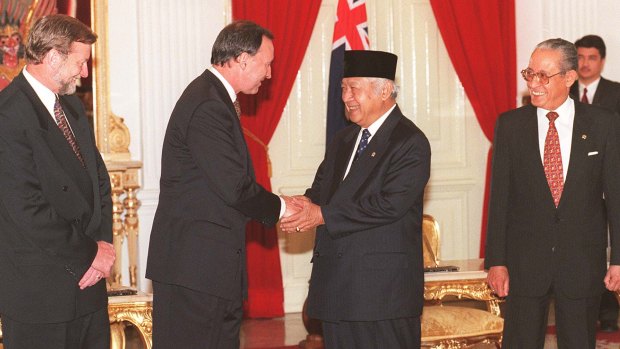 Gareth Evans and Paul Keating meet with President Soeharto and Ali Alatas after the signing of an Australia-Indonesia security treaty in 1995. 